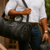 Leather Top Grain Duffel Bag for Men and Women Travel Bag MK 083 (Black) 27.5”*11.5”*11” Inches (L*H*B) Leather Top Grain Duffel Bag for Men and Women Travel Bag MK 083 (Black) 27.5”*11.5”*11” Inches (L*H*B)